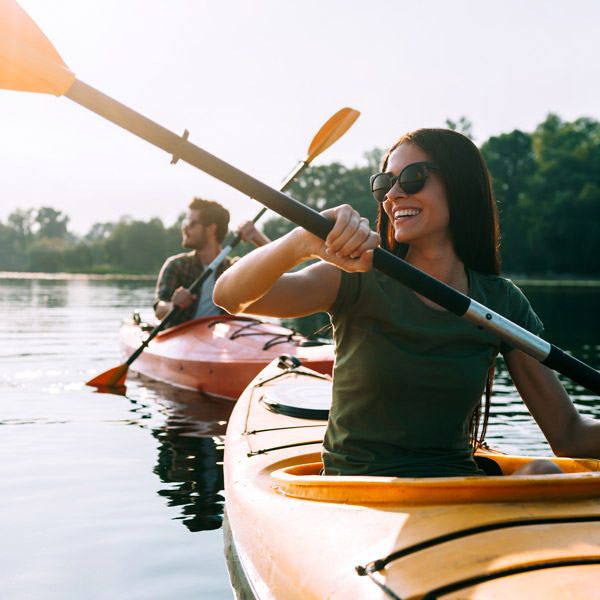 young couple kayaking